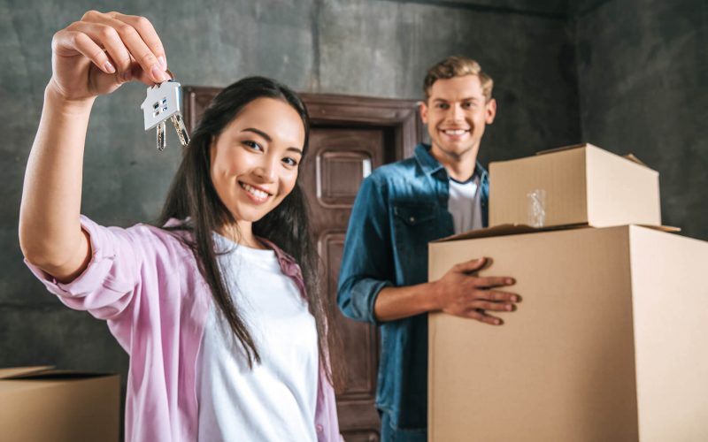 beautiful-interracial-couple-moving-into-new-home-ZR2VH2V.jpg